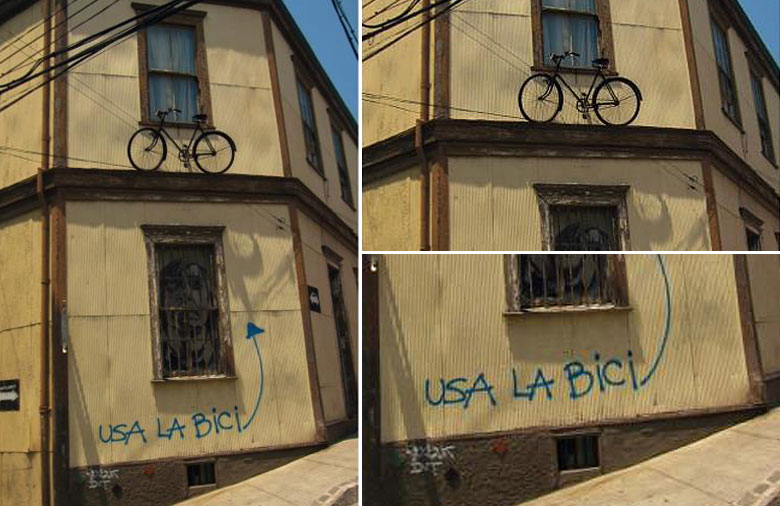 Das Bild zeigt die Fassade eines Hauses. Auf dem Absatz des ersten Stocks steht ein Fahrrad. Darunter steht ein Graffiti an der Hauswand, das zu ‚usa la bici’ (‚Nutz das Fahrrad!’) aufruft und ein Pfeil, der auf das Fahrrad zeigt.